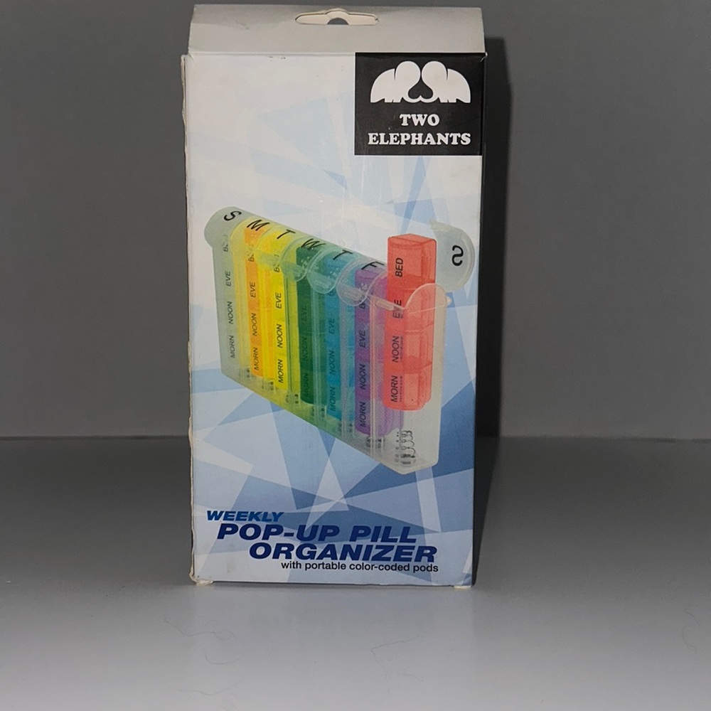 Weekly pop-up pill organizer